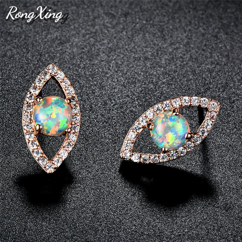 Уникальные серьги-гвоздики RongXing из розового золота с белым/синим огненным опалом