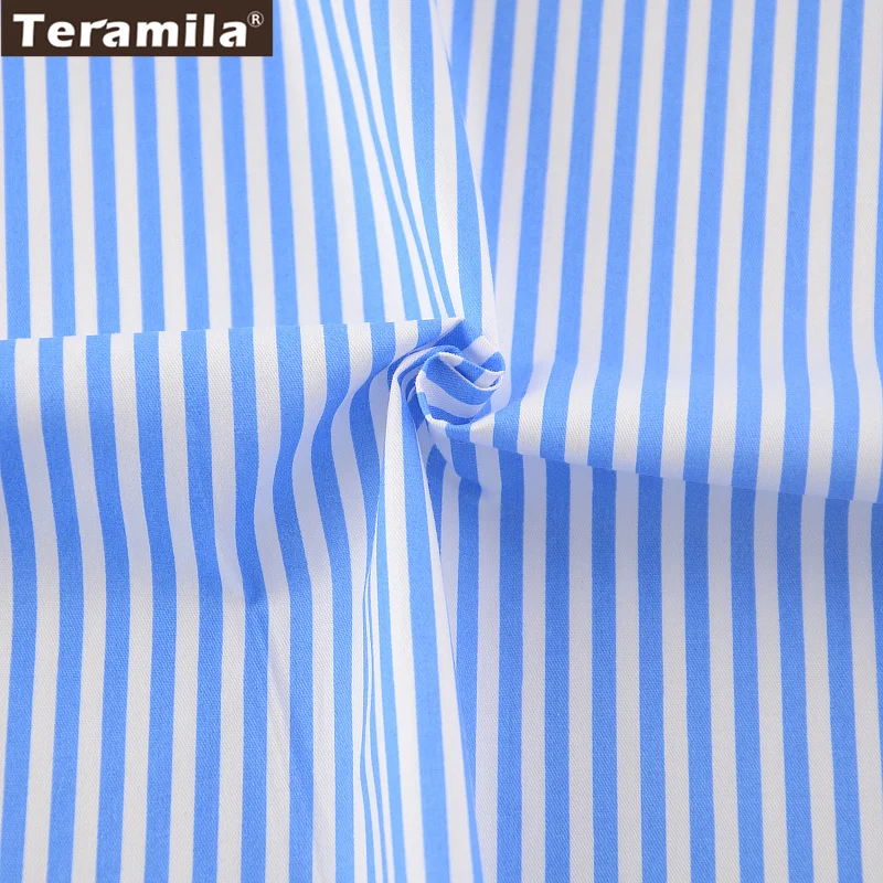 Хлопчатобумажная ткань с принтом в синюю полоску саржевая четверть жира