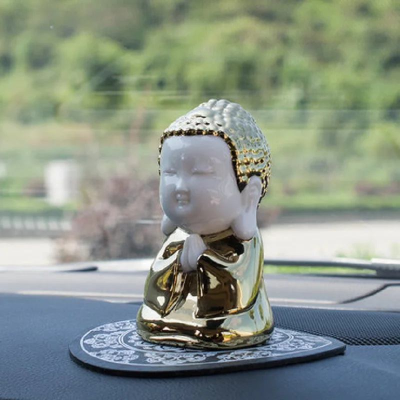 

The gilded Buddha ornaments each purchase of a ID