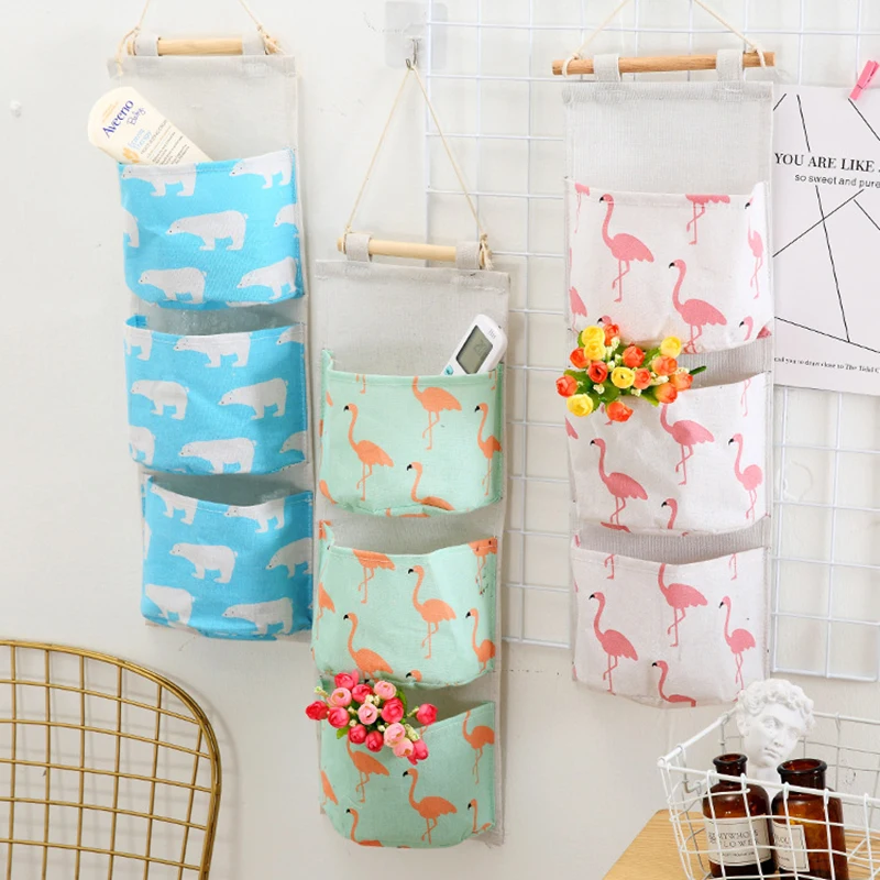 

New Flamingo Pattern Wall Mounted Wardrobe Hang Bag Cotton Linen Hanging Storage Bag 3 Pocket Wall Pouch Cosmetic Toys Organizer