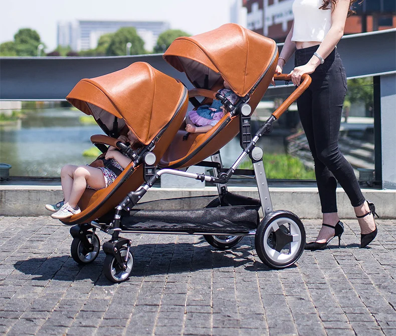 Двойная коляска Bugaboo осла, модная верхняя одежда для мам и уход за кожей лица бок близнецов второго ребенка раза коляска
