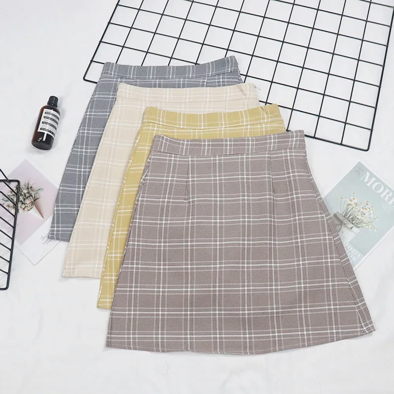 Маленькая симпатичная летняя клетчатая юбка в британском стиле узкая облегающая