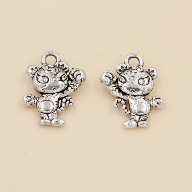 Оптовая продажа подвески из тибетского серебра в виде тигра размером 16x12 мм 60 шт. |