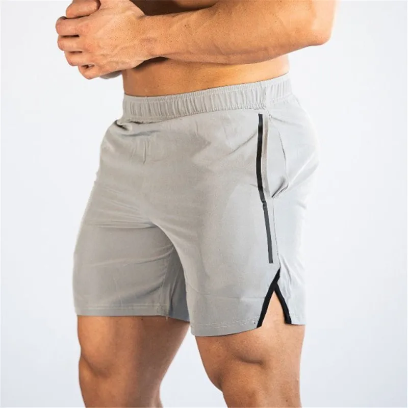 Light gray Новые летние мужские брендовые шорты для фитнеса бодибилдинга, дышащие быстросохнущие сетчатые шорты, спортивные штаны для бега, модные шорты - Цвет: Light gray
