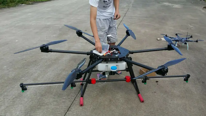 Нагрузка пестицида Multicopter защиты сельскохозяйственное растение 10-20 KG/максимальный Летающий вес 45 KG