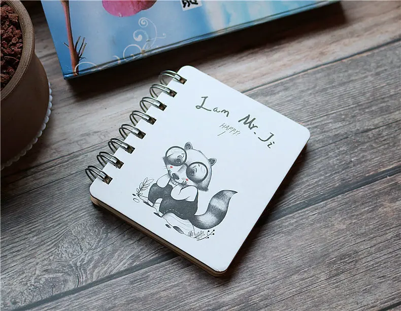A7 Cute little animal notebook Hard surface iron ring hand holding portable notepad Student notebook - Цвет: raccoon