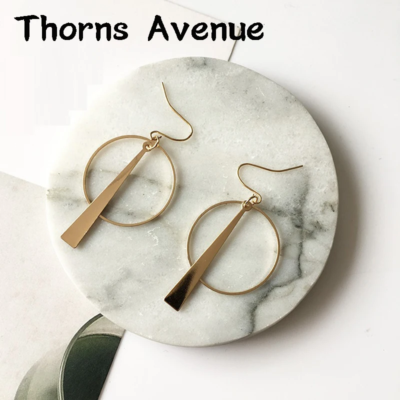 Новые модные серебристые круглые геометрические сережки с кисточками