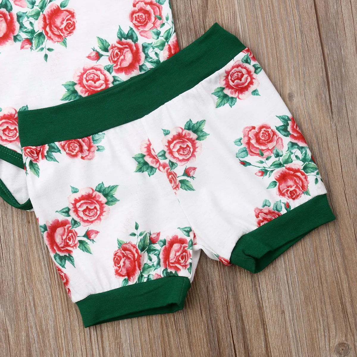 Комплект одежды для новорожденных девочек из 3 предметов розовый комбинезон с