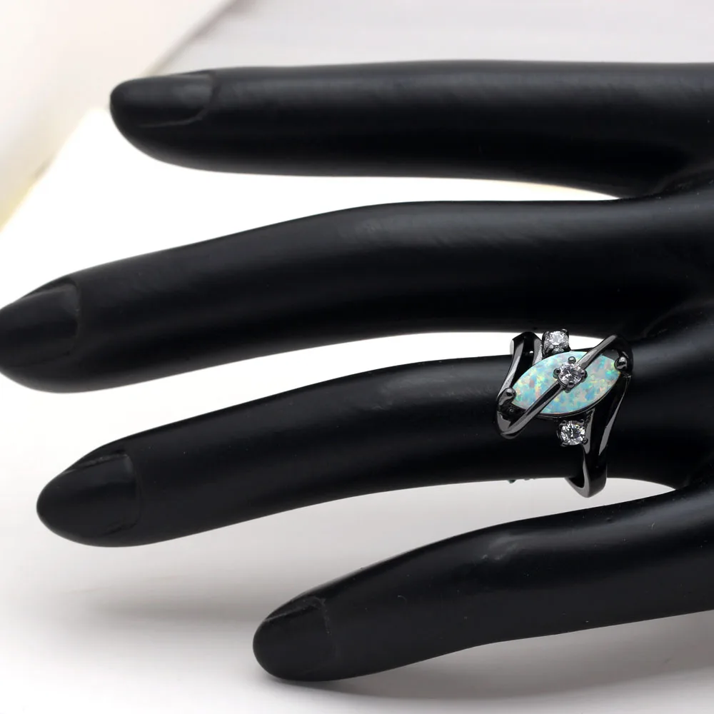 Женское кольцо с черным покрытием кольца перекрёстным огненным опалом маркиза