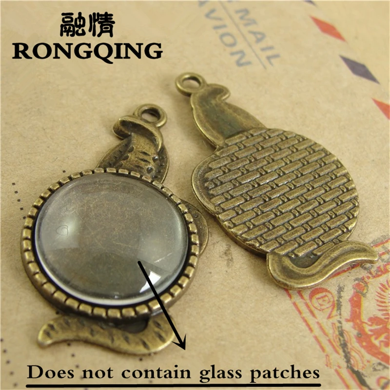 

RONGQING 50pcs/lot cobra Retro Tray DIY Accessories Wholesale Craft 16MM