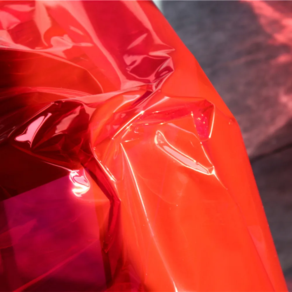 Прозрачная флуоресцентная яркая лазерная ткань тпу 50x100 см производительность