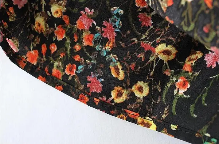 Женский комбинезон с завязками на спине черный пикантный круглым вырезом