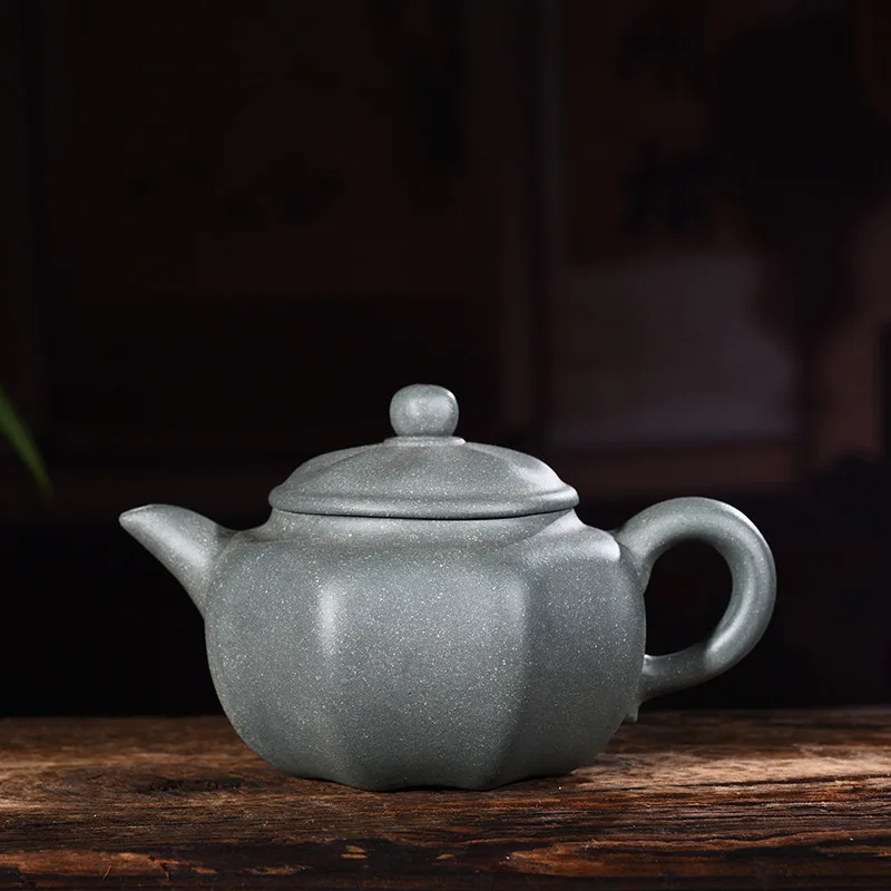 

Yixing purple clay pot genuine hand-made raw ore green mud octagonal pot Kungfu teapot tea set one hair substitute