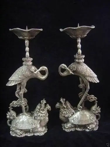 

A Pair of Elaborate Chinese Tibetan Silver Candlestick Carved with Turtle Crane Statue