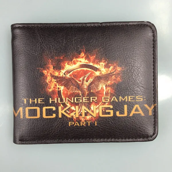 The movie hunger games около трех значков разделяющая птица смеется над кошельком Голодные