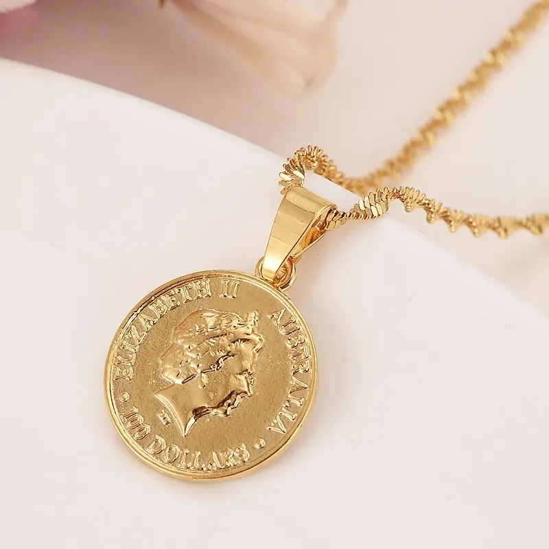 Серебряные серьги подвески в виде австралийской юбилейбет с золотым наполнением