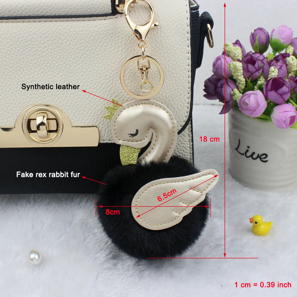 Брелок для ключей с двумя крыльями блестками короной искусственным мехом |