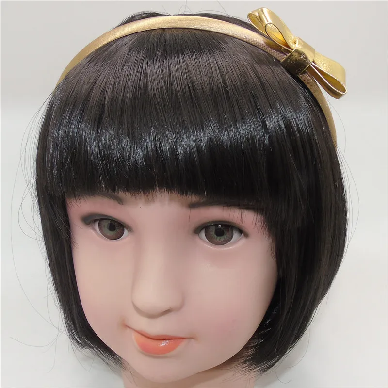 Повязка на голову из искусственной кожи с бантом золотистая/серебристая |