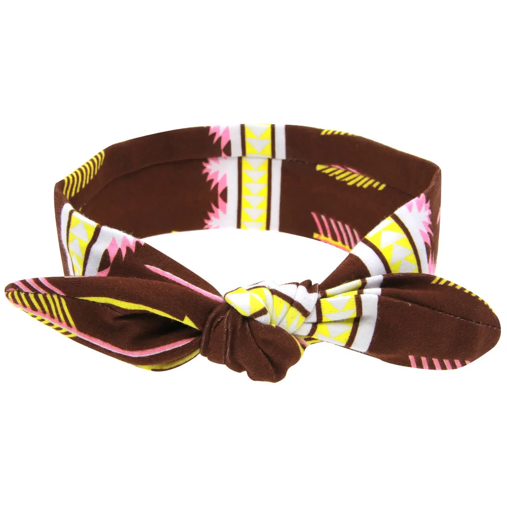 Повязка на голову женская с бантом модный аксессуар для волос в виде зайчика