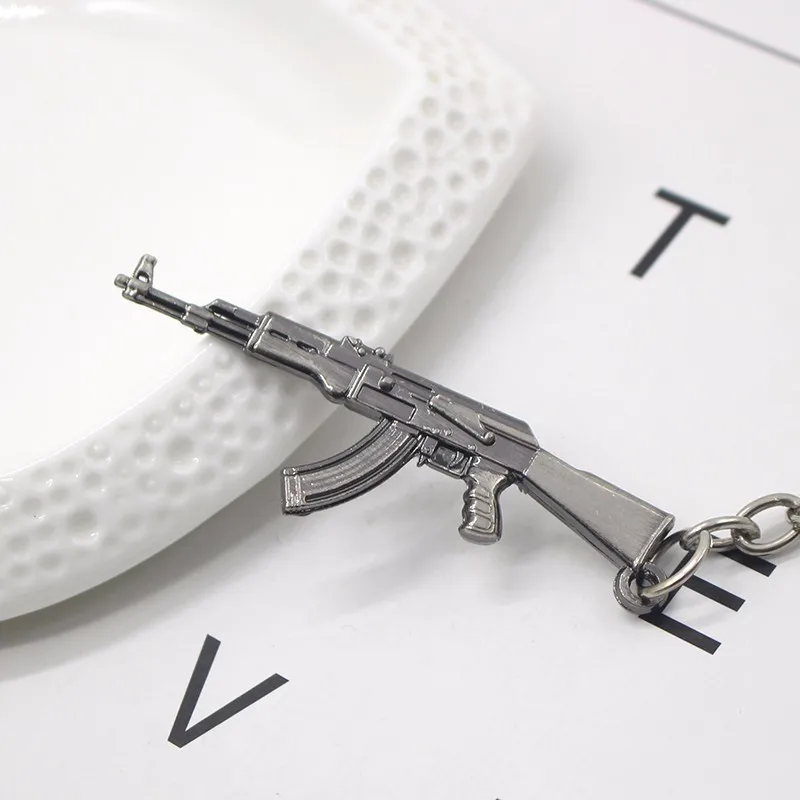 Модный AK-47 пистолет брелок-пистолет M60 пустынный Орел левое колесо пистолет брелок стрелковое оружие Модель металлический брелок ювелирные изделия Прямая поставка