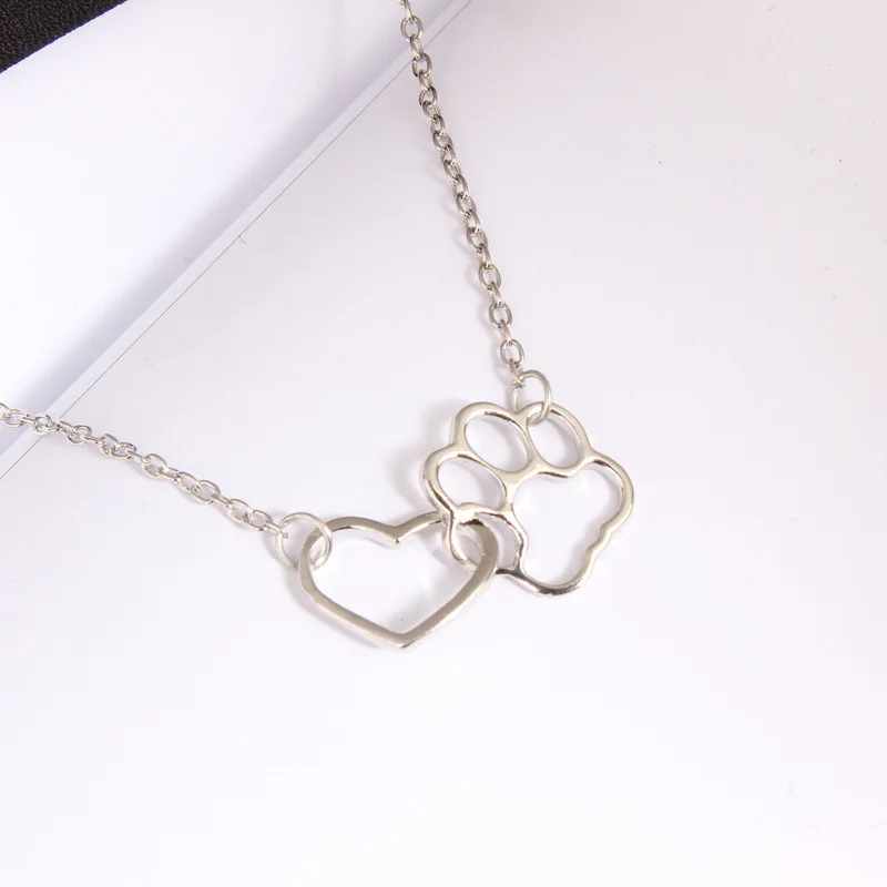 

Hollow Pet Paw Footprint Necklaces Shellhard Cute Animal Dog Cat Love Heart Pendant Necklace For Women Girls Jewelry Necklace
