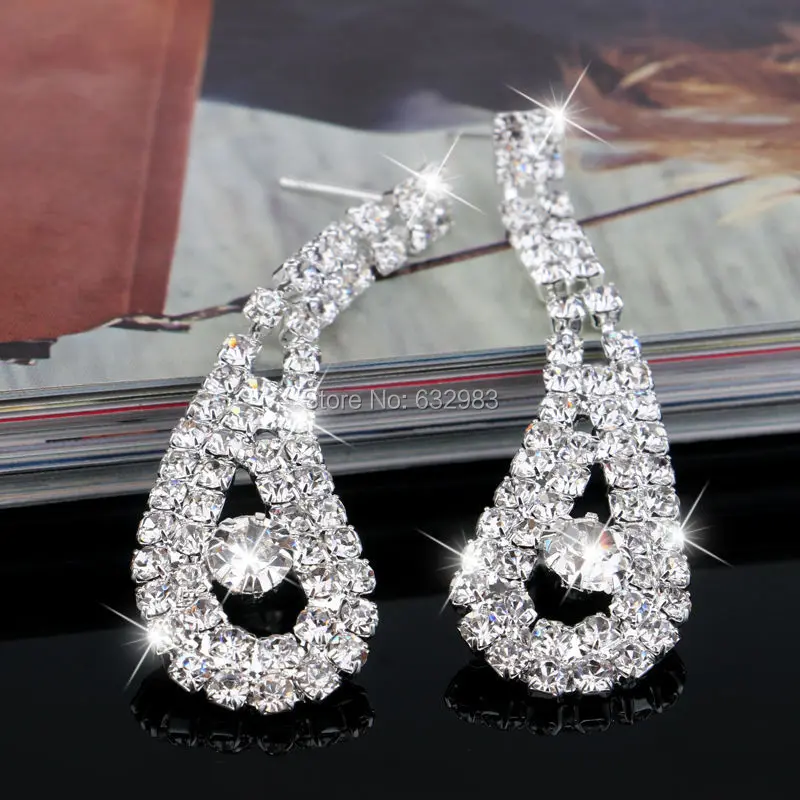 Серьги подвески женские с павлиньими перьями висячие ювелирные украшения для