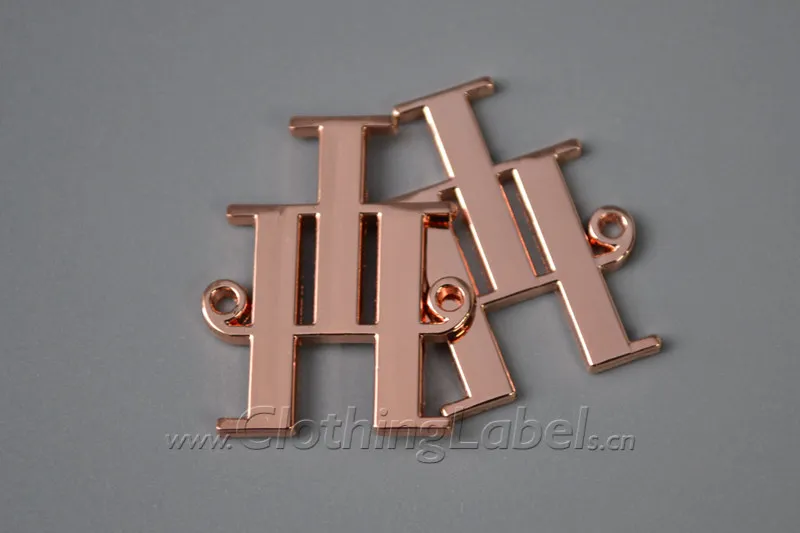 

Rose gold metal label tag, custom beautiful logo shape for bags and garments
