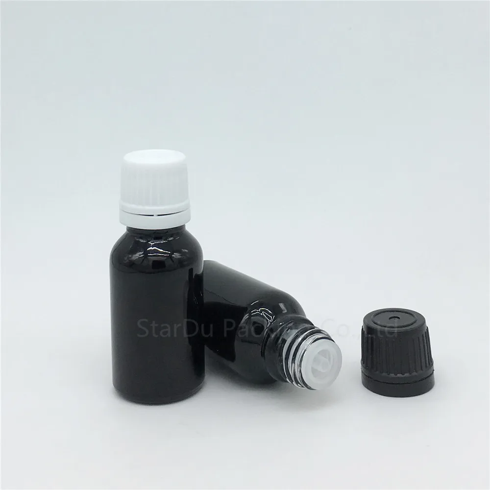 

Free Shipping 500pcs 15ML Black Bottle , 15cc Vials Essential Oil Bottle with tamper evident cap Perfume glass bottles