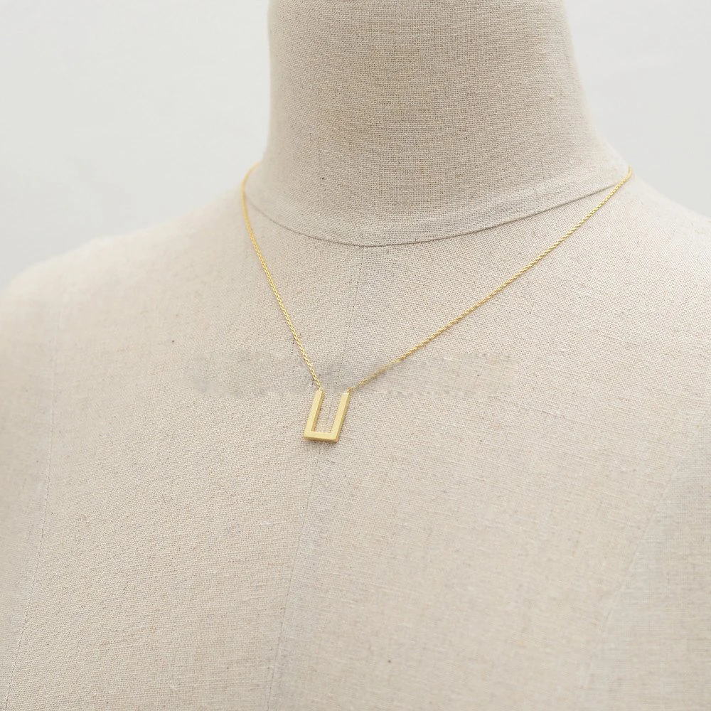 Подвеска u образной формы с красивым рисунком на поверхности образных ожерелий