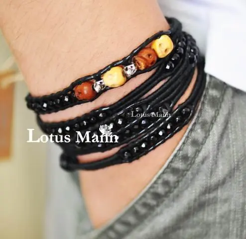 

Lotus mann Limited skeleton series black stone winding black leather cord bracelet - neutral