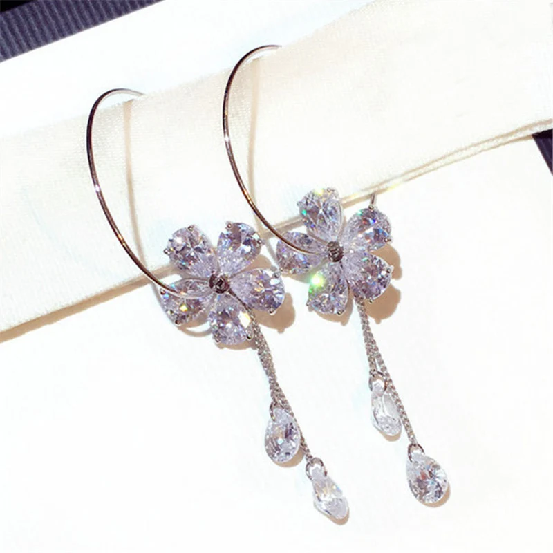 Женские серьги кольца Charmwin длинные с кубическим цирконием цветами и