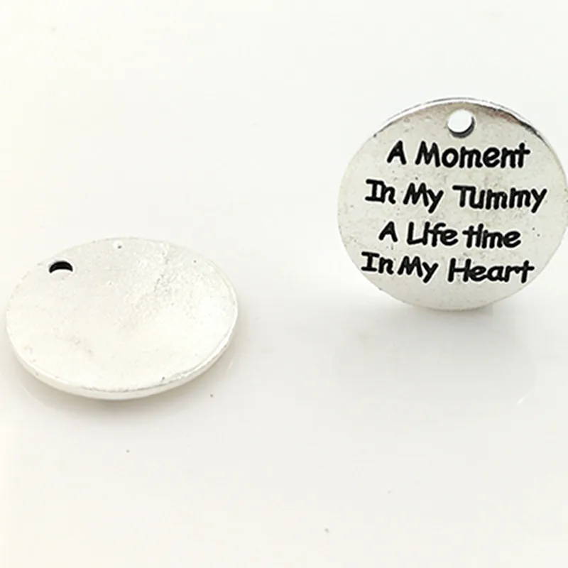 

High Quality 20 Pieces/Lot 25mm Antique Silver colour letter printed a moment in my tummy charm round disc message charms