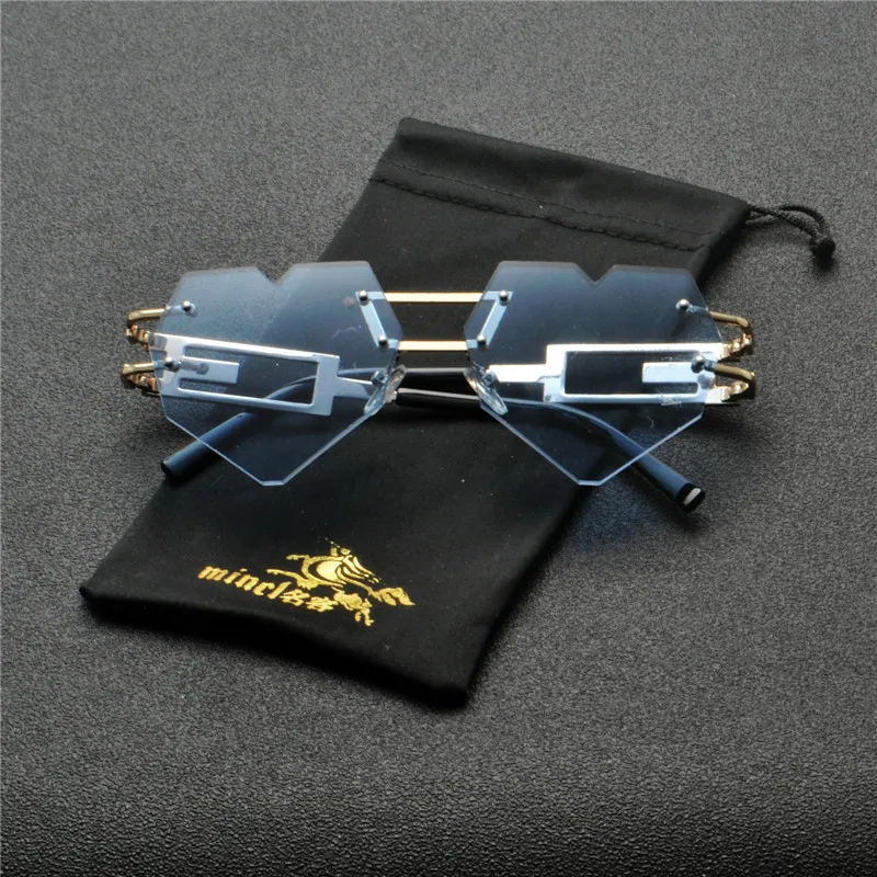 Модные солнцезащитные очки с сердечком для женщин цельные линзы без оправы ярких