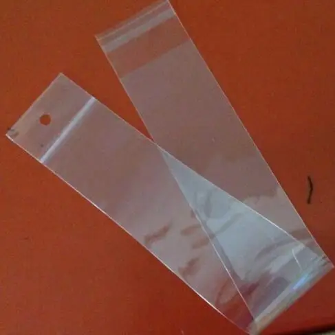 100 шт. Длинные самоклеящиеся прозрачные пакеты для упаковки волос с заголовком.