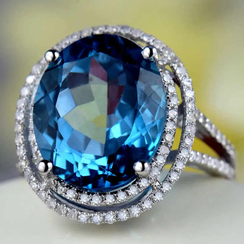 Обручальное кольцо из белого золота с натуральным топазом 11 х13 мм | Украшения и