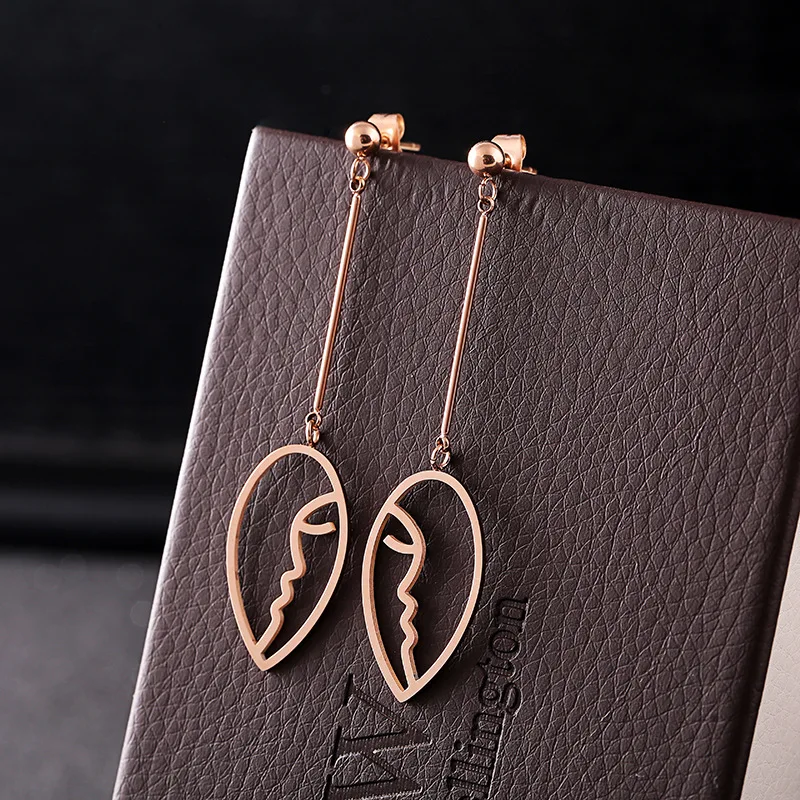 

Jewelry & Accessories/Fashion Jewelry/ Abstract Face titanium steel/ Rose gold earrings female type wholesale
