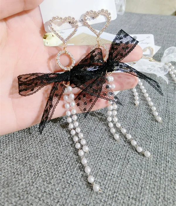 Женские серьги-подвески с большим кружевным бантом жемчугом и стразами модные