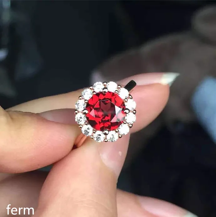 

KJJEAXCMY fine jewelry Sunflowers women's ring 925 silver inlaid natural garnet wholesale ladies