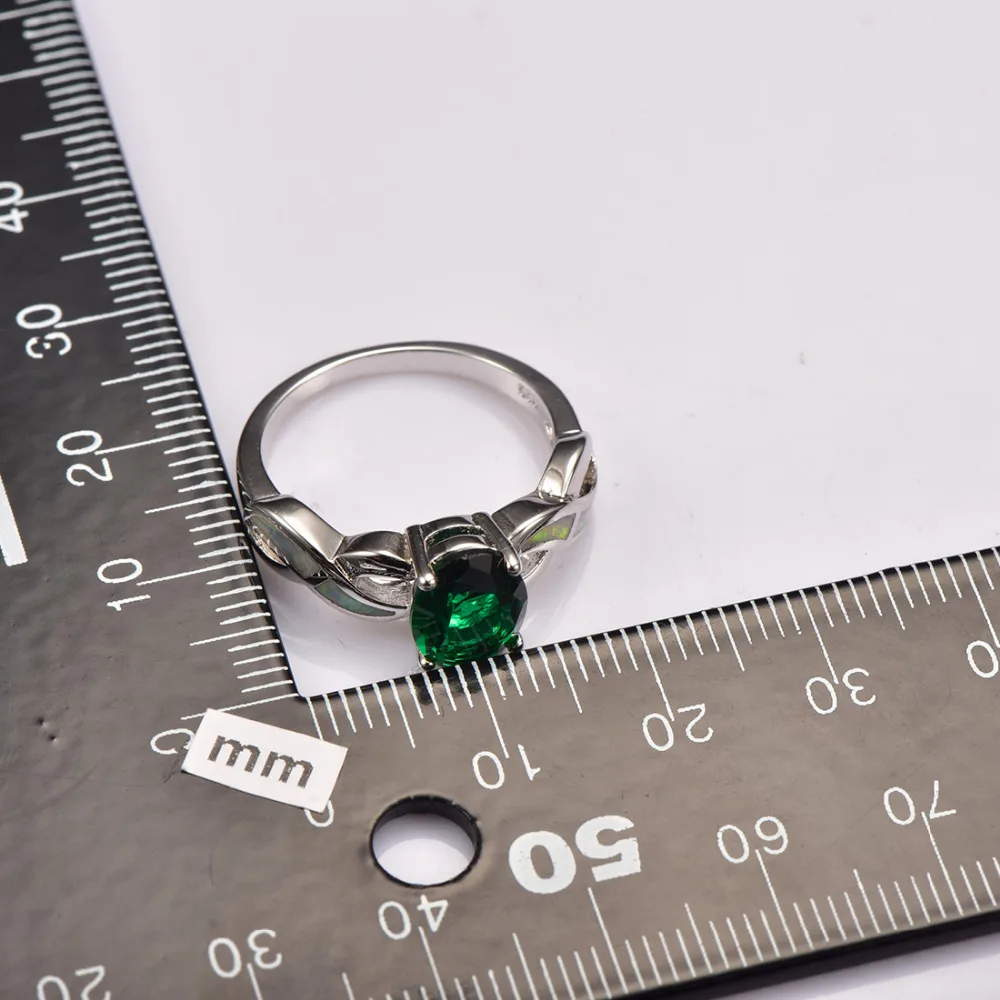 Женское кольцо с искусственным изумрудом белым огненным опалом ювелирное