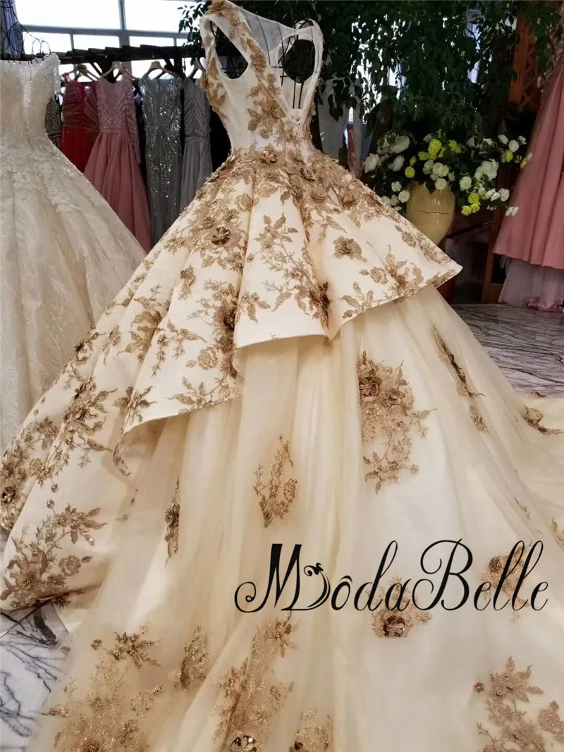 Платье для свадьбы Modabelle Deluxe цвета шампанского золотого с объемным цветком
