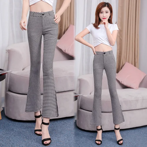 Женские брюки с завышенной талией на молнии карманами расклешенные разрезами по