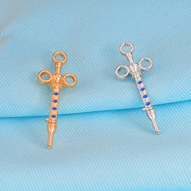 Шприц золотого и белого цветов с кристаллами подарок для