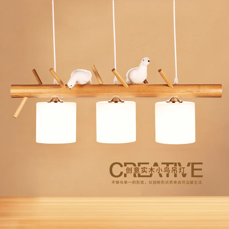 

Nordic three Japanese restaurant droplight contracted logs dining room creative arts study stage solid wooden bird lamps