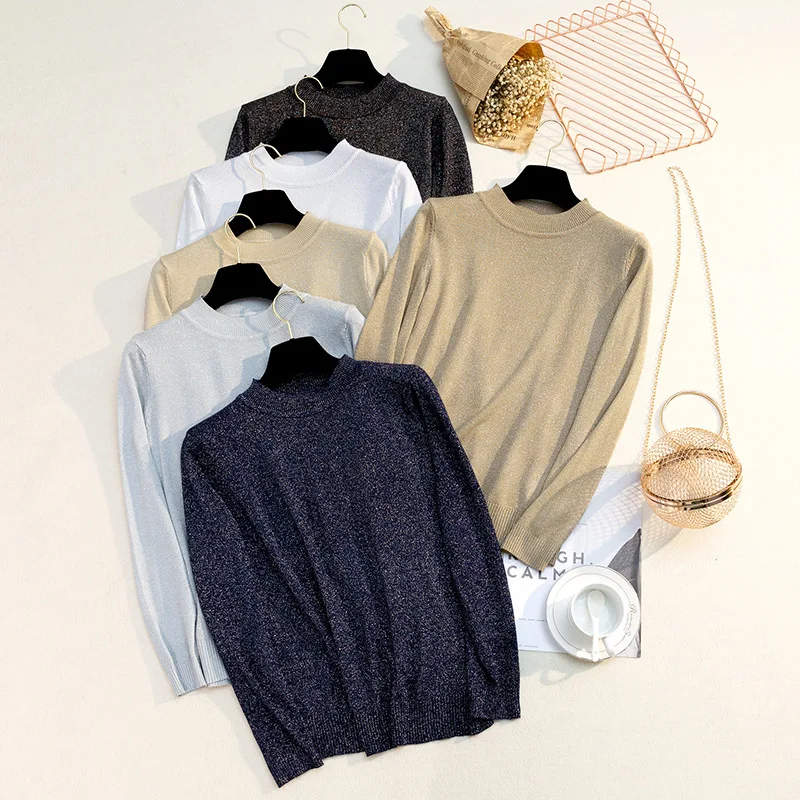 

Женский трикотажный свитер с круглым вырезом