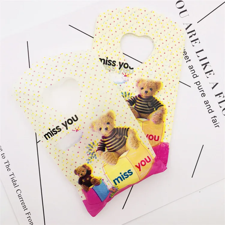 Yellow Black Bear Милые мини-19 видов стилей, 50 шт./лот, маленькие пластиковые сумки с ручками, 9x15 см, вечерние подарочные сумки для конфет, упаковки ювелирных изделий с ручками - Цвет: Yellow Black Bear