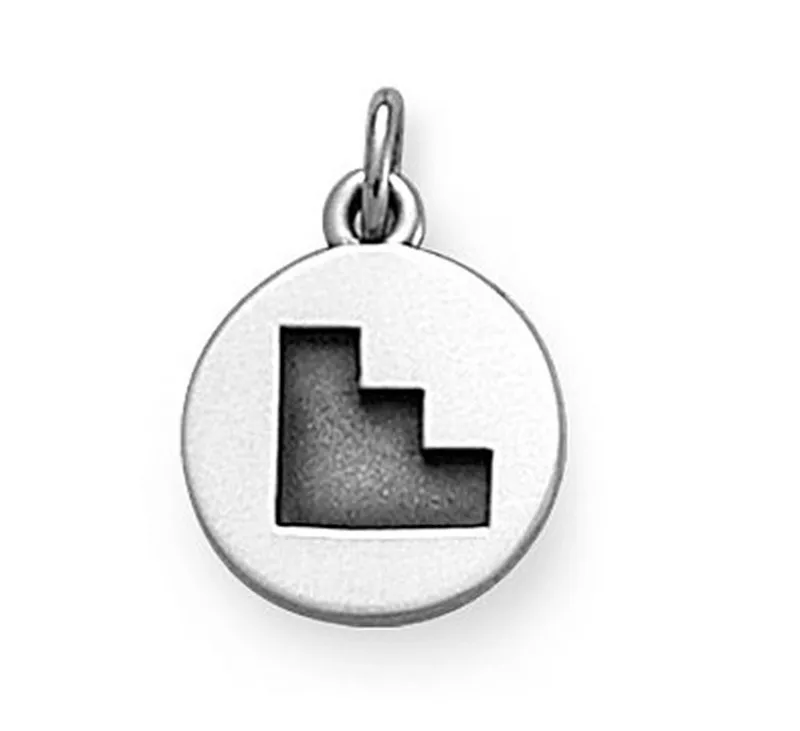 

artfully crafted Cherokee Disc Charm antique silver plated jewelry