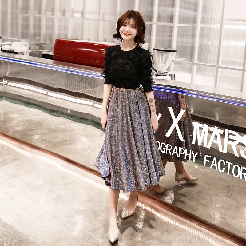 Черное вечернее платье с рукавом до локтя и кружевом длина ниже колена вечерние