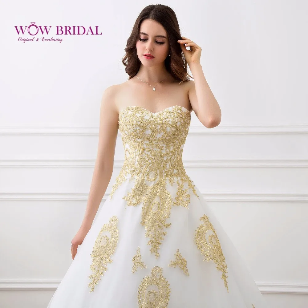 Wowbridal свадебное платье трапециевидной формы с вышивкой золотистого цвета белым