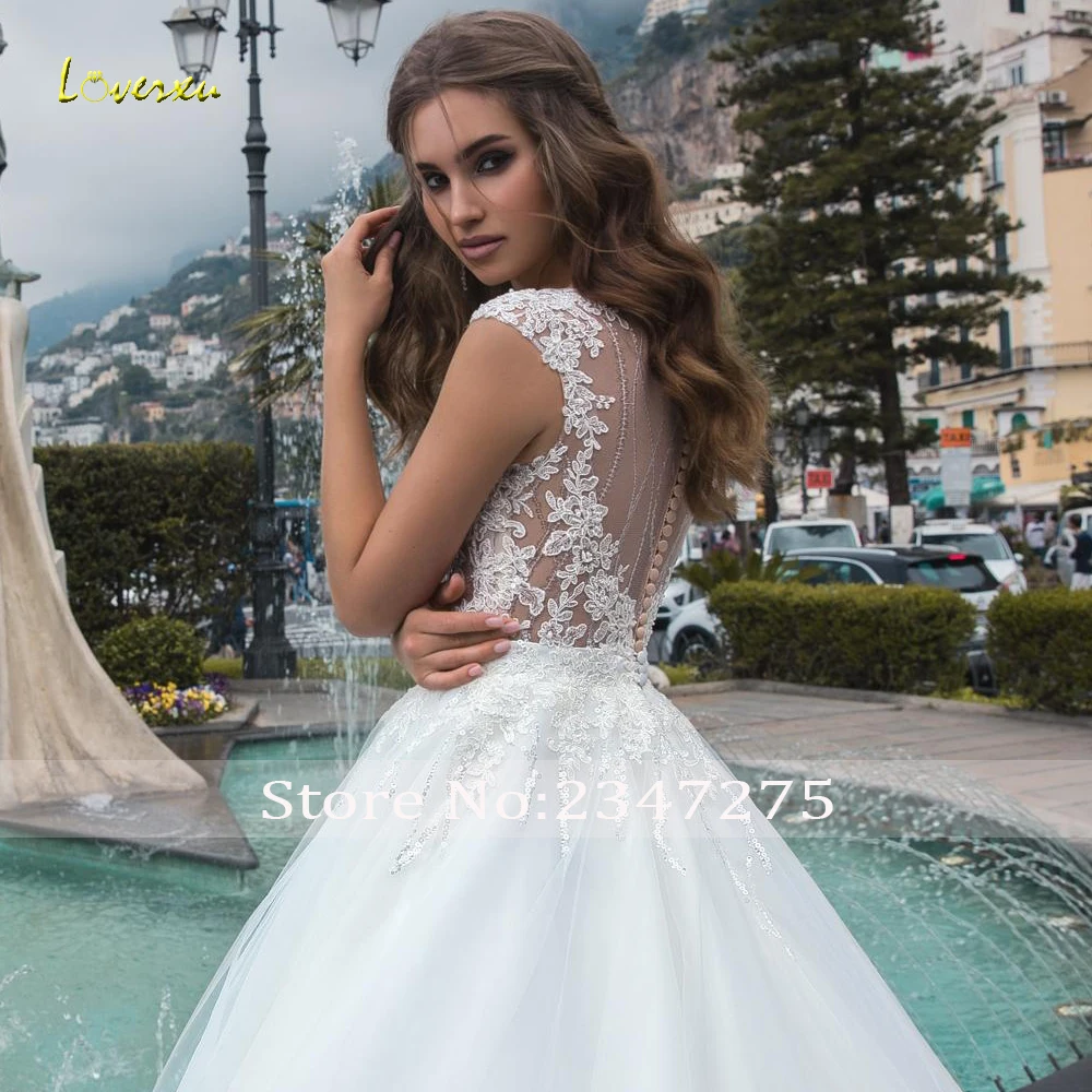 

Loverxu Sexy Illusion Scoop Neck Lace A Line Wedding Dresses 2020 Luxury Applique Beaded Sequined Court Train Bridal Gowns