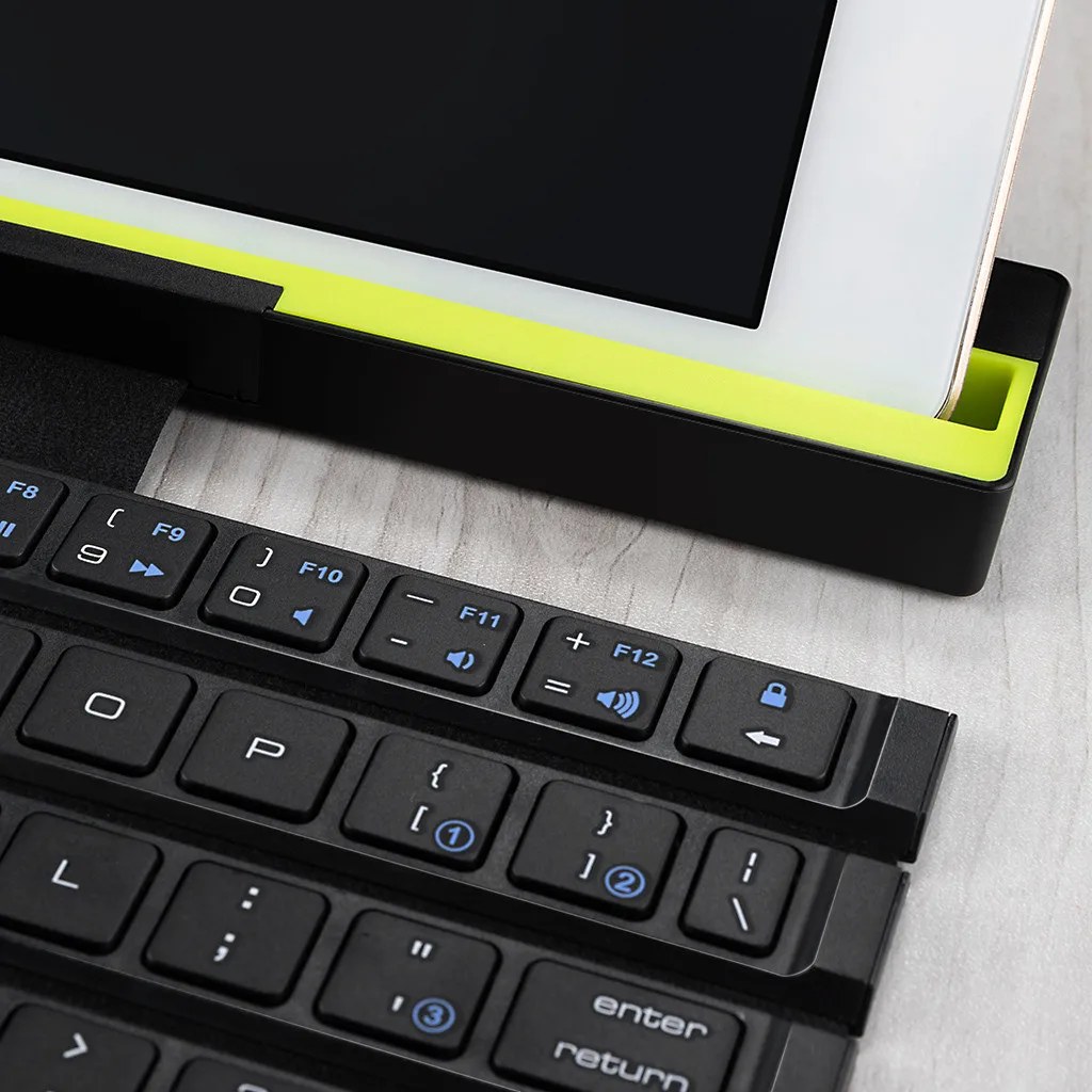 

Mini Foldable Keyboard With Holder Wireless Bluetooth Keyboard 64 Keys Universal Roll Up Quick Response 252*46.8*28.8mm 718#3